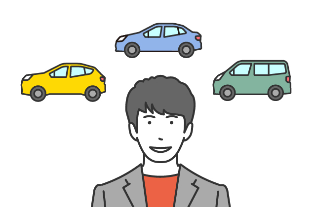 男性と背景に三台の車の画像